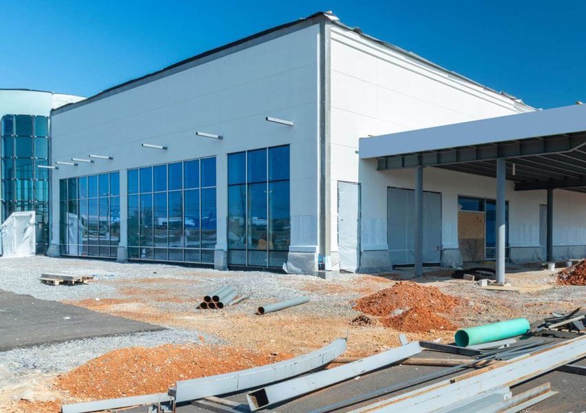 tall windows on a commercial building in process of being built